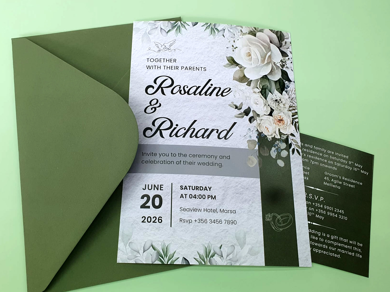 Elegant wedding invitations with green envelope